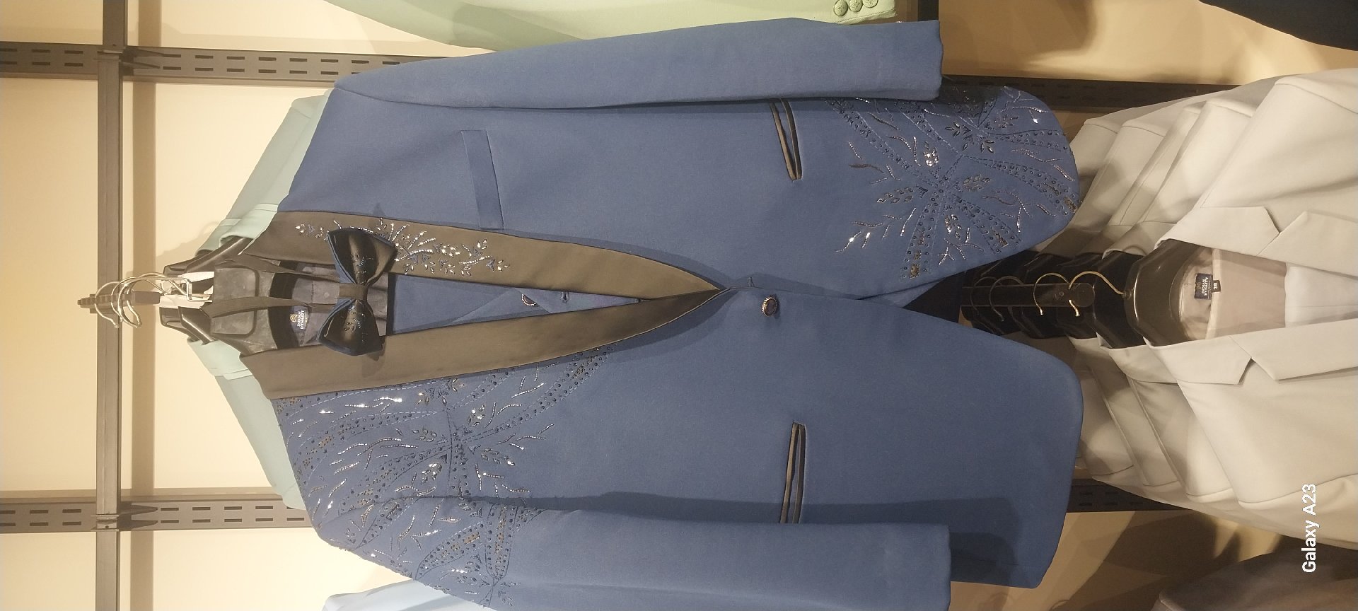 Dark blue embroidery suite for rent in Kochi