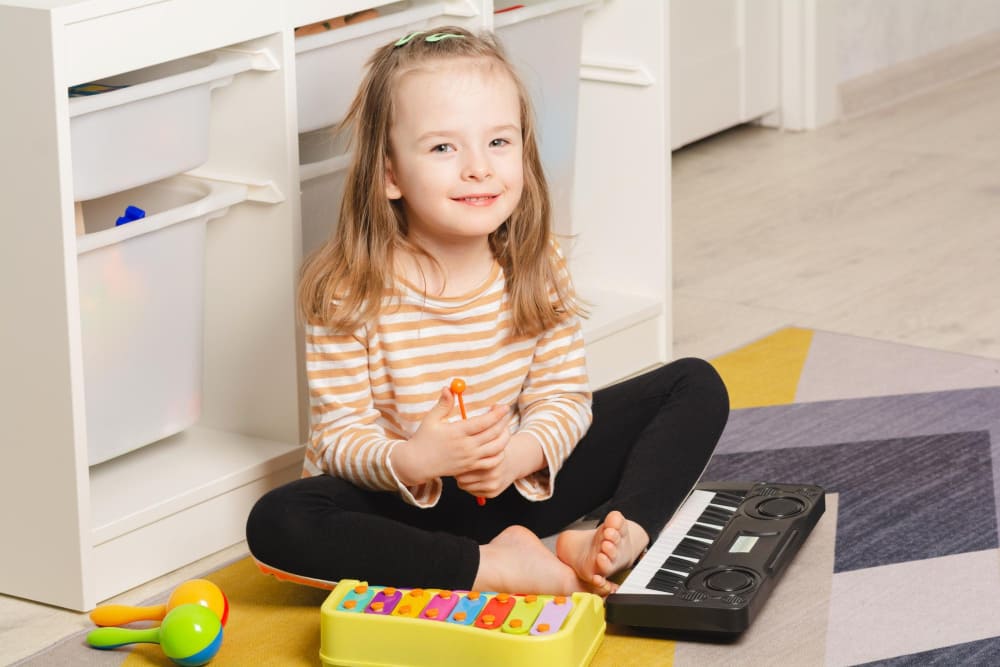 kid playing audio instrument