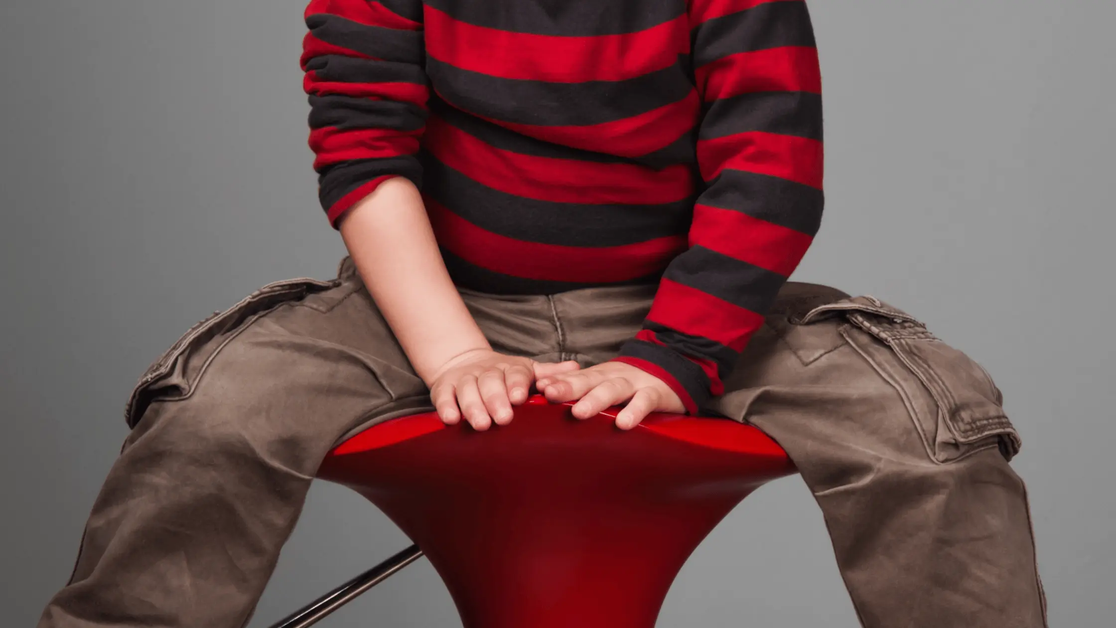 Sitting on a low stool