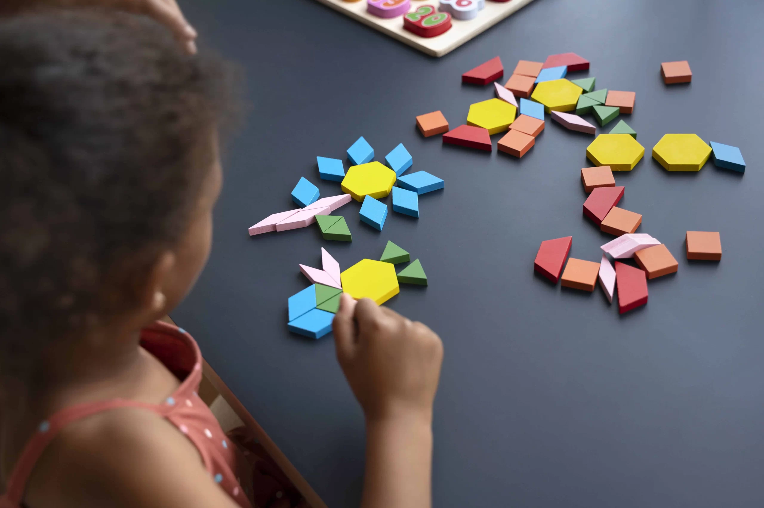 Girl making puzzle
