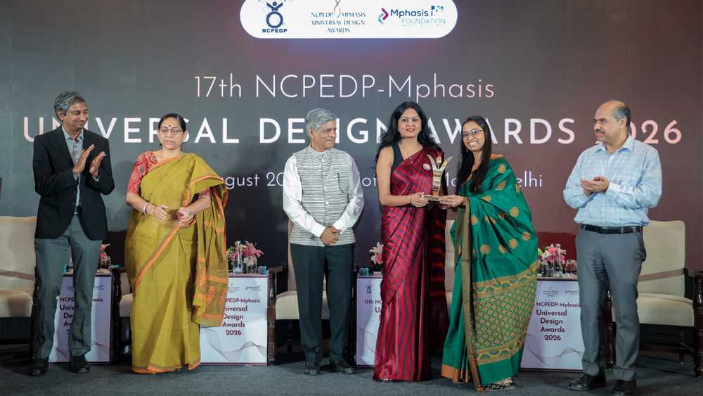 Laharee receiving the role model working professional award at NCPEDP Awards 2026.