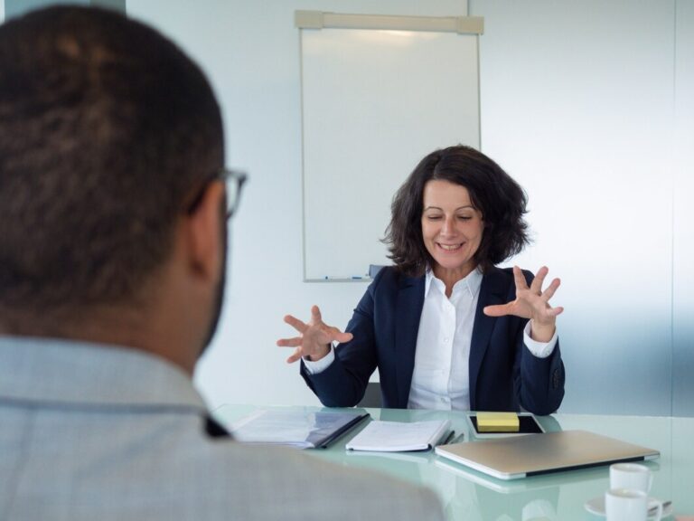 human-resource-manager-interviewing-male-applicant.jpg