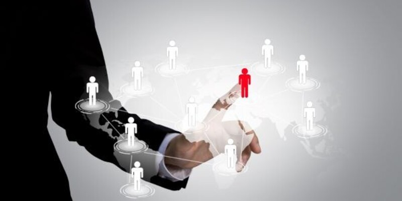 Executive touching a icon in the social network