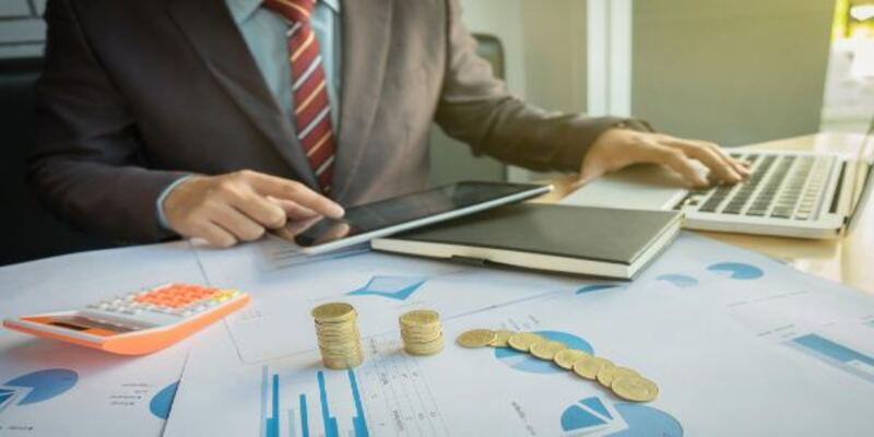 Midsection of man using technologies