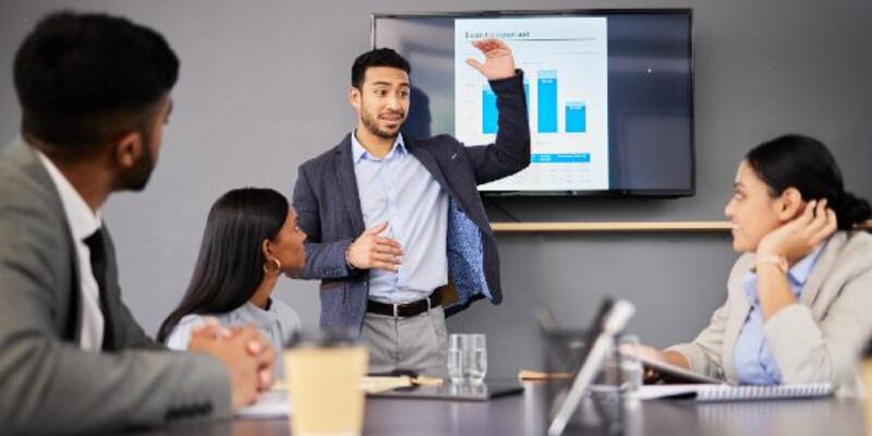 This should help our case shot of a young businessman giving a presentation