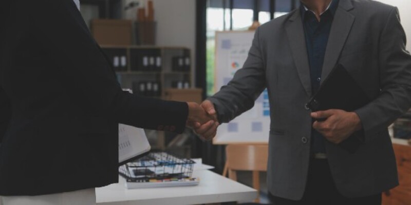 Two people shaking hands