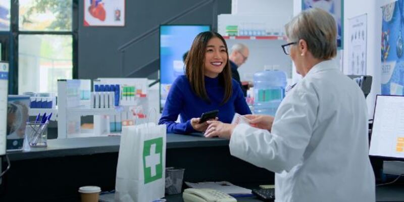Customer at pharmacy counter