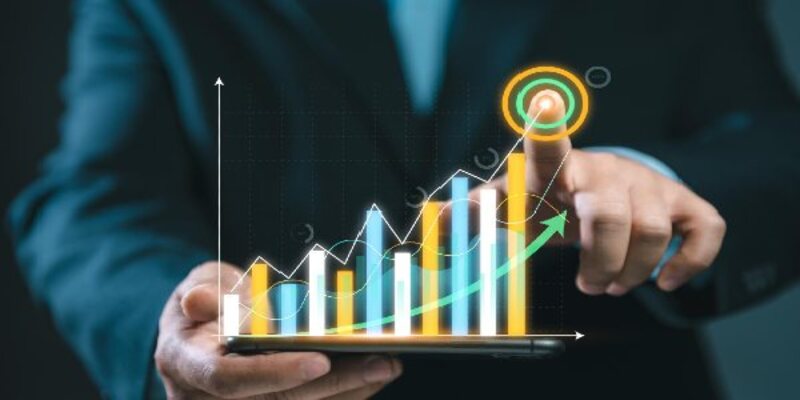 Business man point plan growth increase of positive indicators graph
