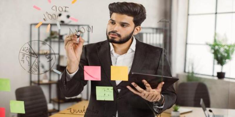 Man working with digital tablet at corporate office