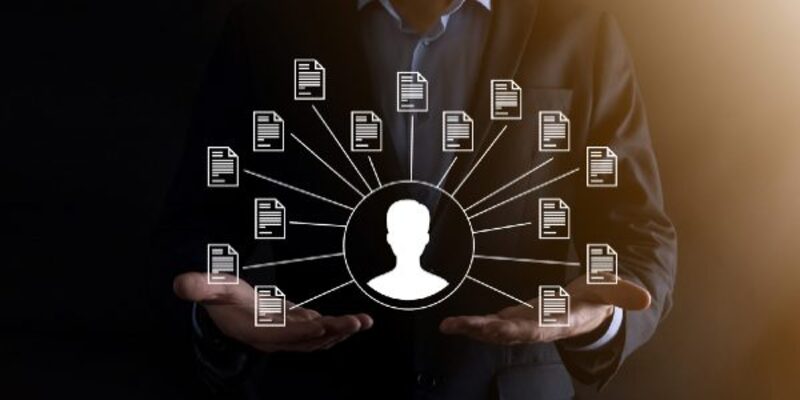 Businessman hold user and document icon