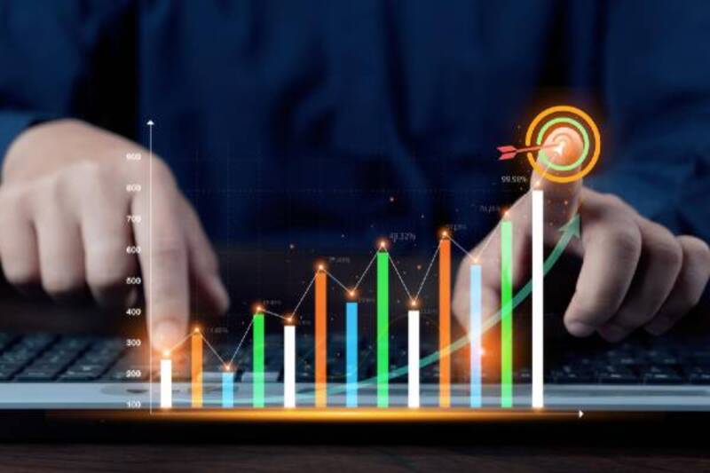 A businessman investor analyzes the profitability