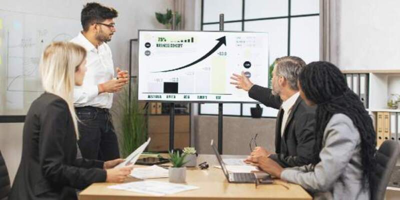Successful confident experienced diverse team of corporative workers