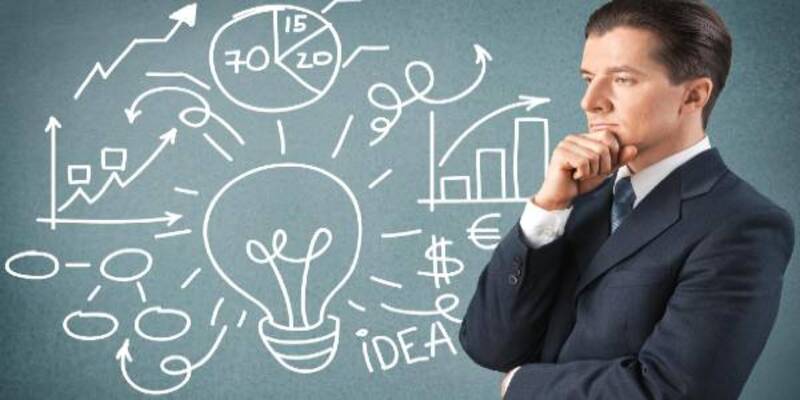 Man having questions and concrete wall with business idea or plan in background