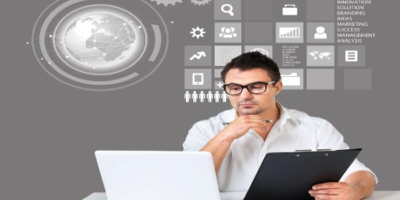 Young business man work with laptop on desk
