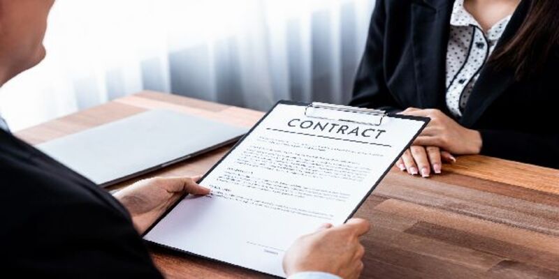 businessman-review-agreement-document-before-signing-contract