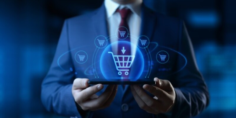 businessman-holding-smartphone-with-ecommerce-retail-icons-screen-ebusiness-shopping