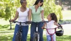 Grandmother mother and granddaughter bike riding