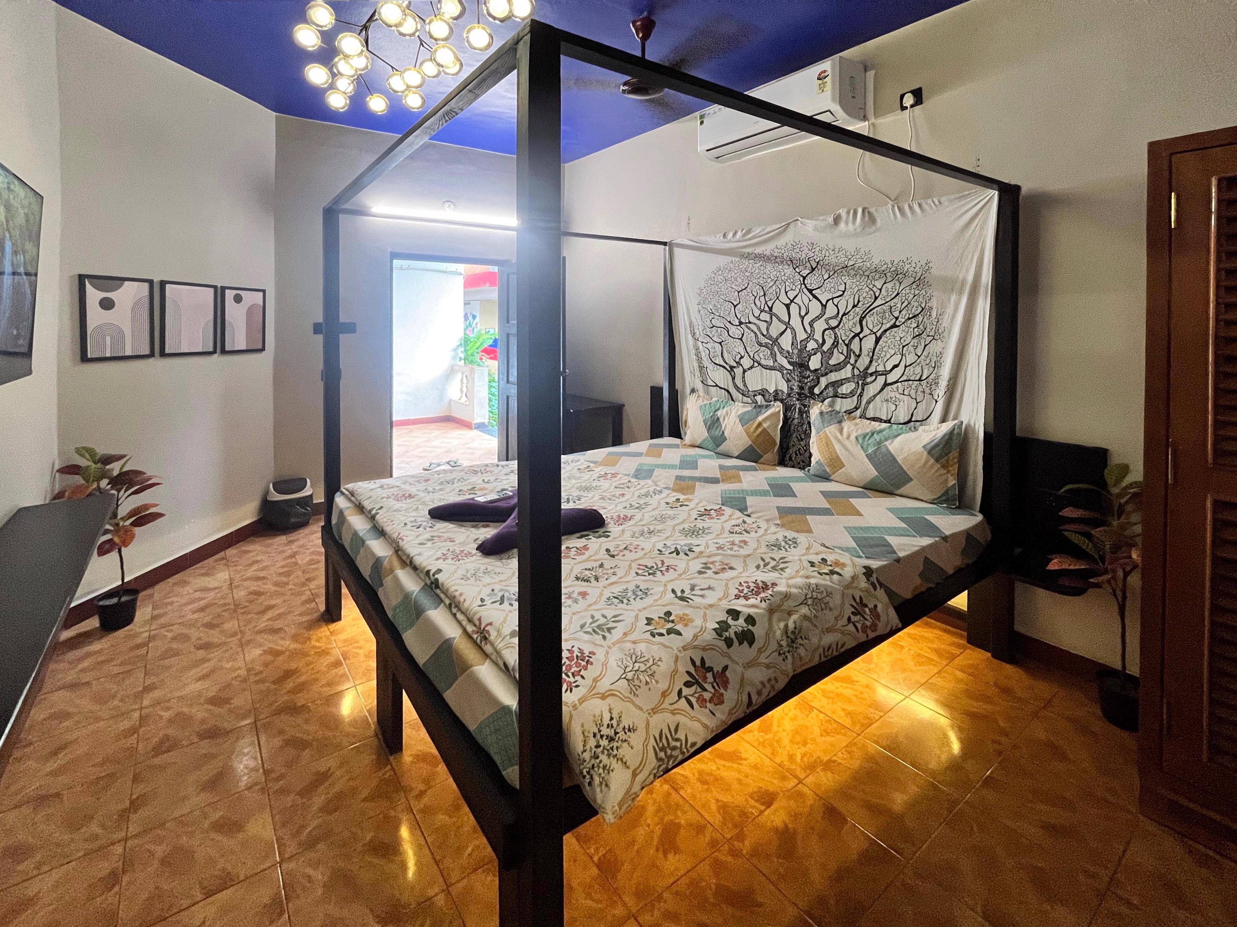 Seaside-themed suite bedroom at La GoYa