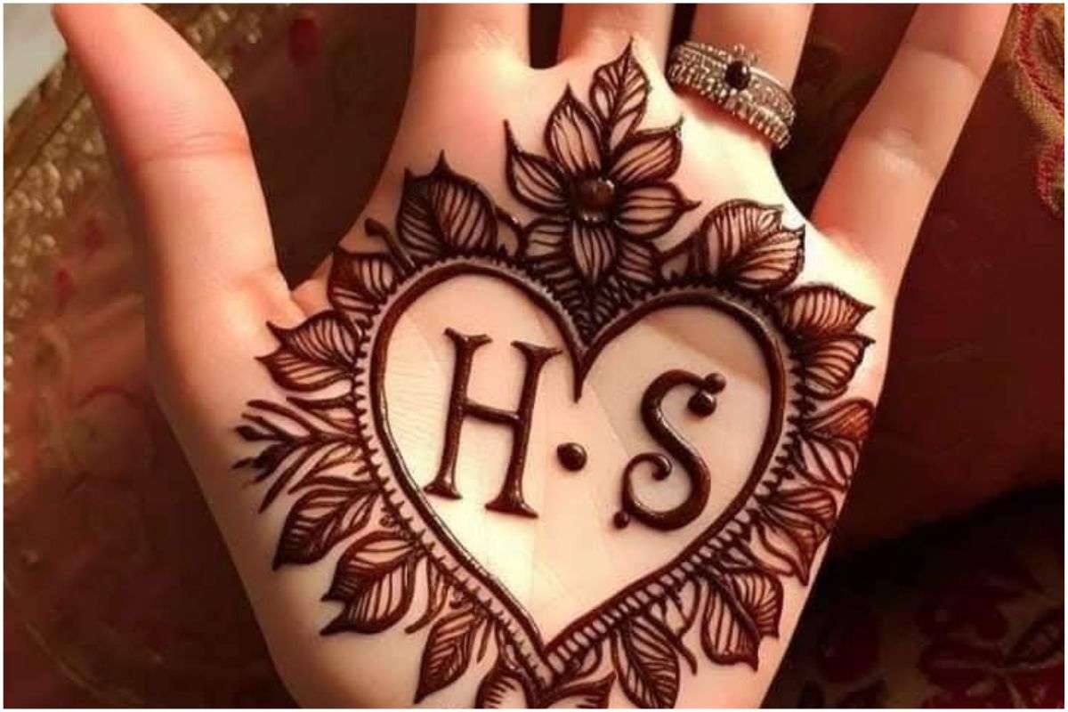 Latest Karwa Chauth Mehndi Designs: पति के नाम से सजाएं हथेलियां, देखें लेटेस्ट मेंहदी डिजाइन्स 2 Hartalika Teej Mehndi Design 3