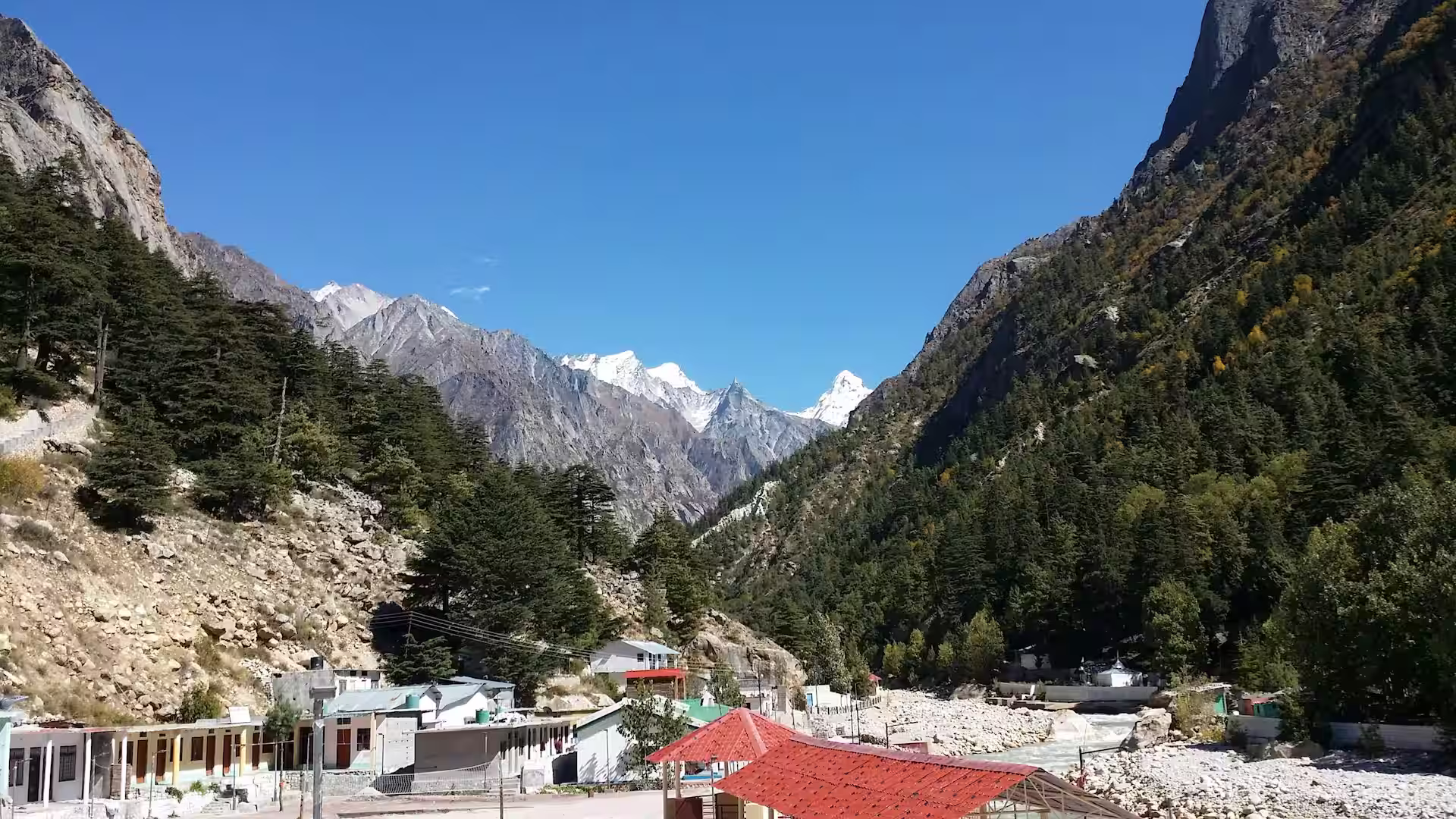 Gangotri Temple surrounded by Himalayan mountains