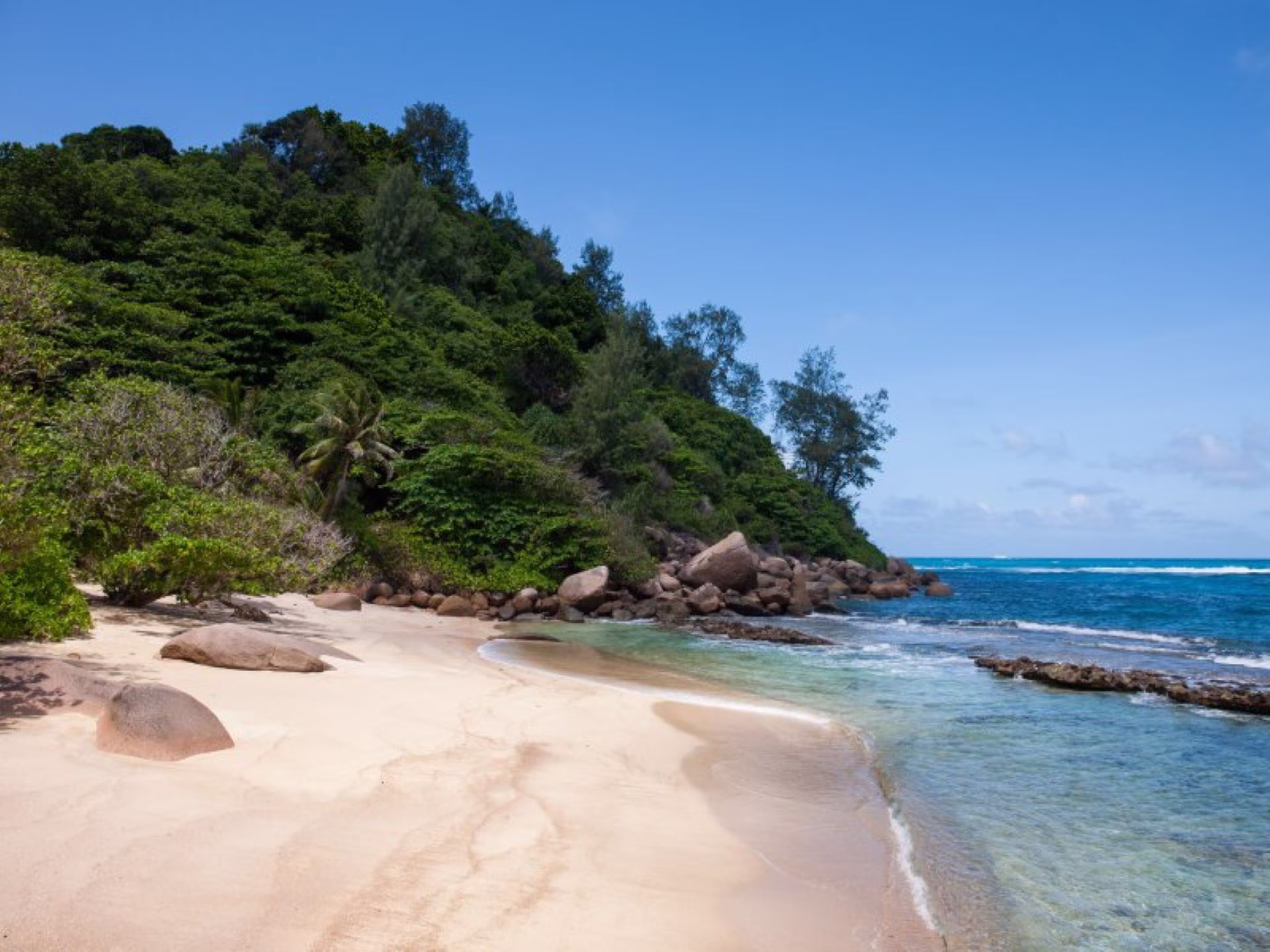 Anse Consolation Beach Seychelles Anse Consolation beach with granite rocks and blue sea in Seychelles