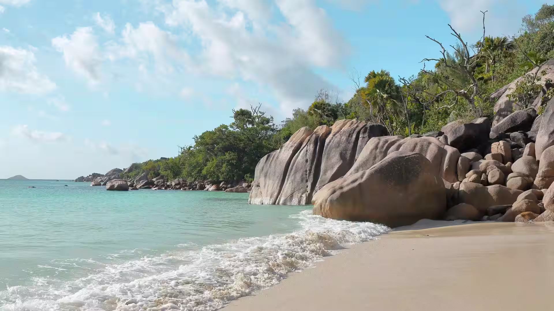 Aerial view of Anse Lazio with turquoise water