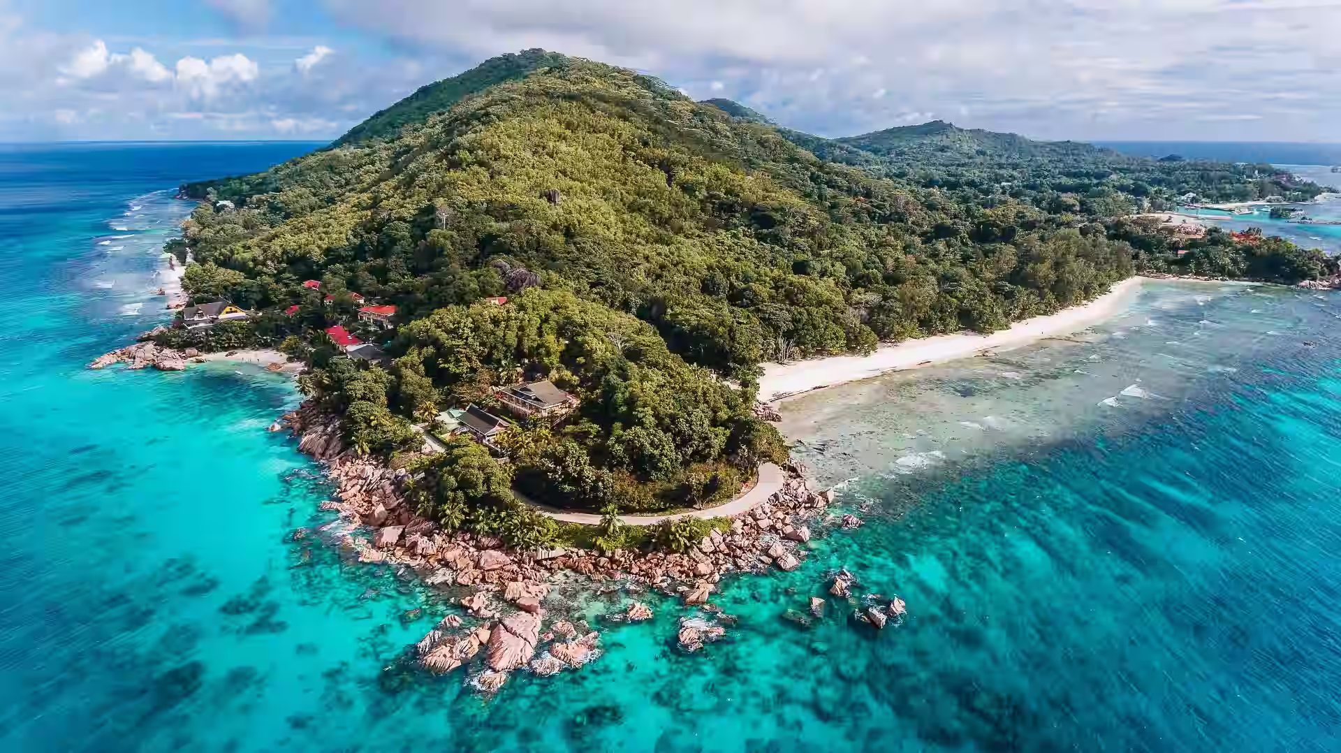 Aerial view of Praslin Island with turquoise water and green hills