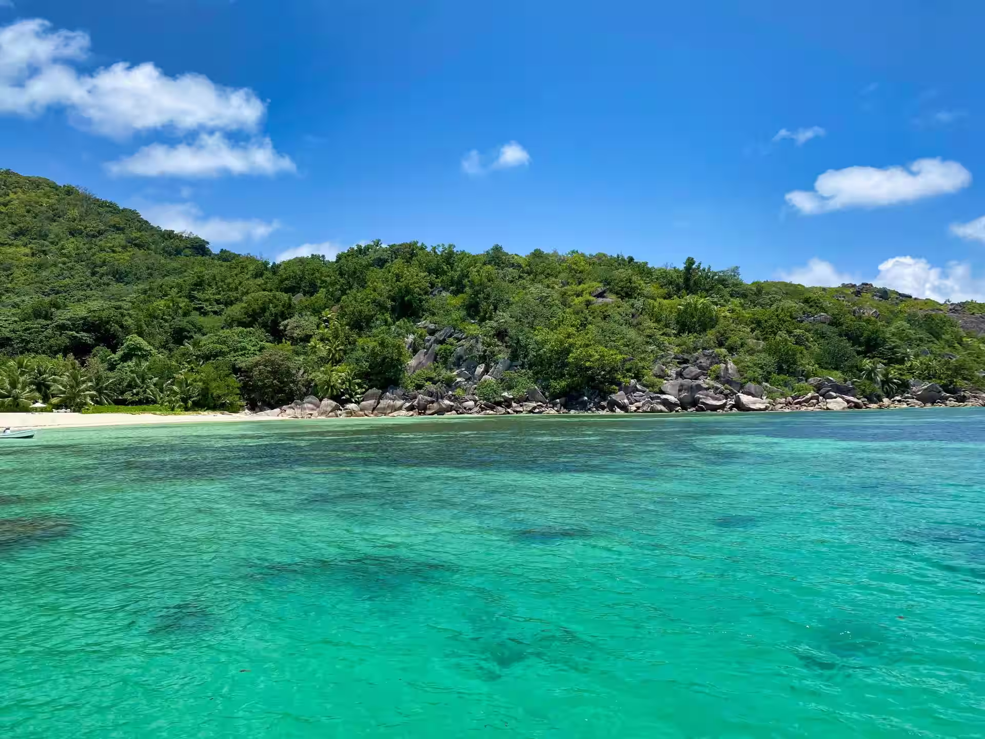Calm lagoon and sandy shore at Anse A La Mouche beach