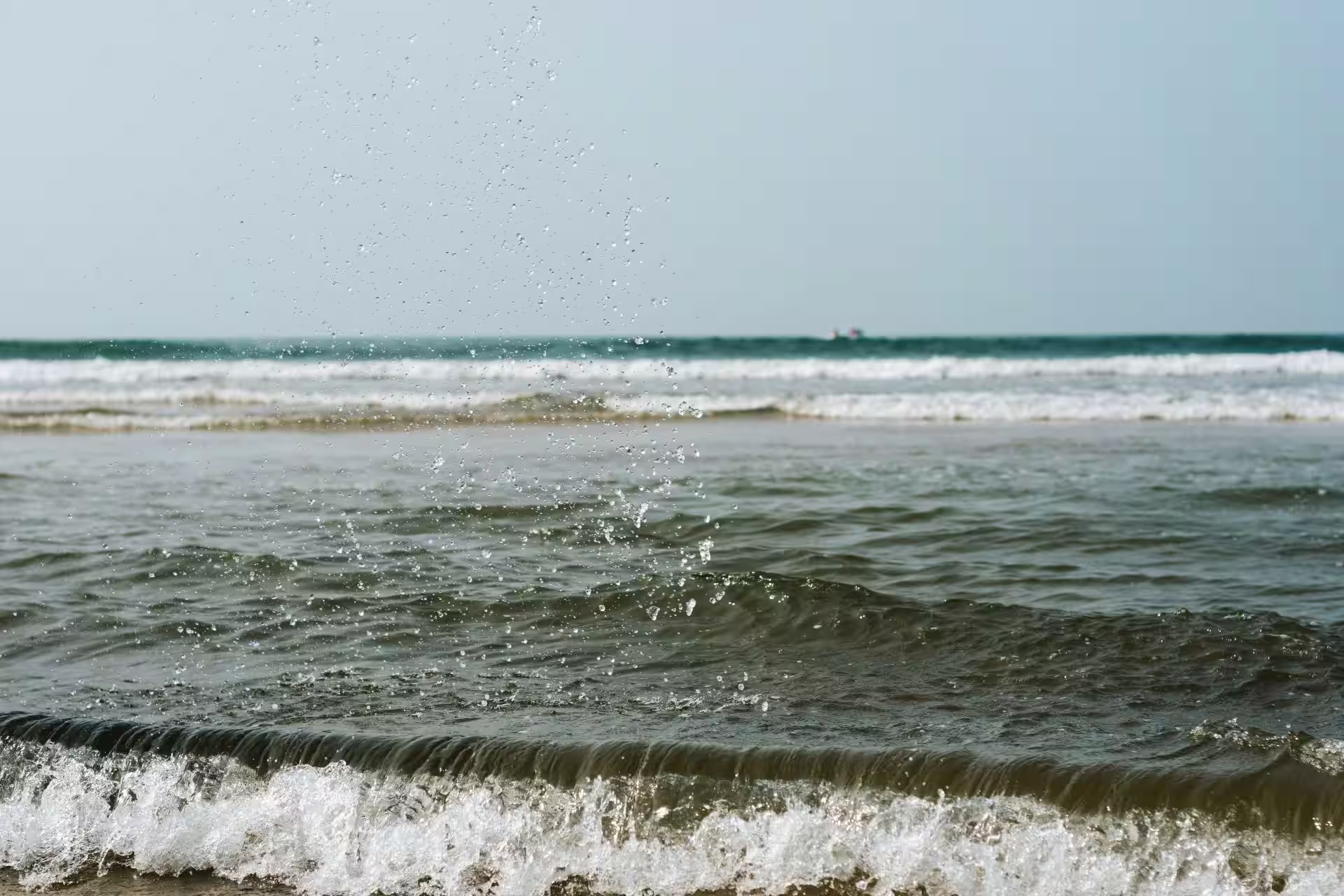 Calm waves and coastal view along the Konkan Coast of Maharashtra