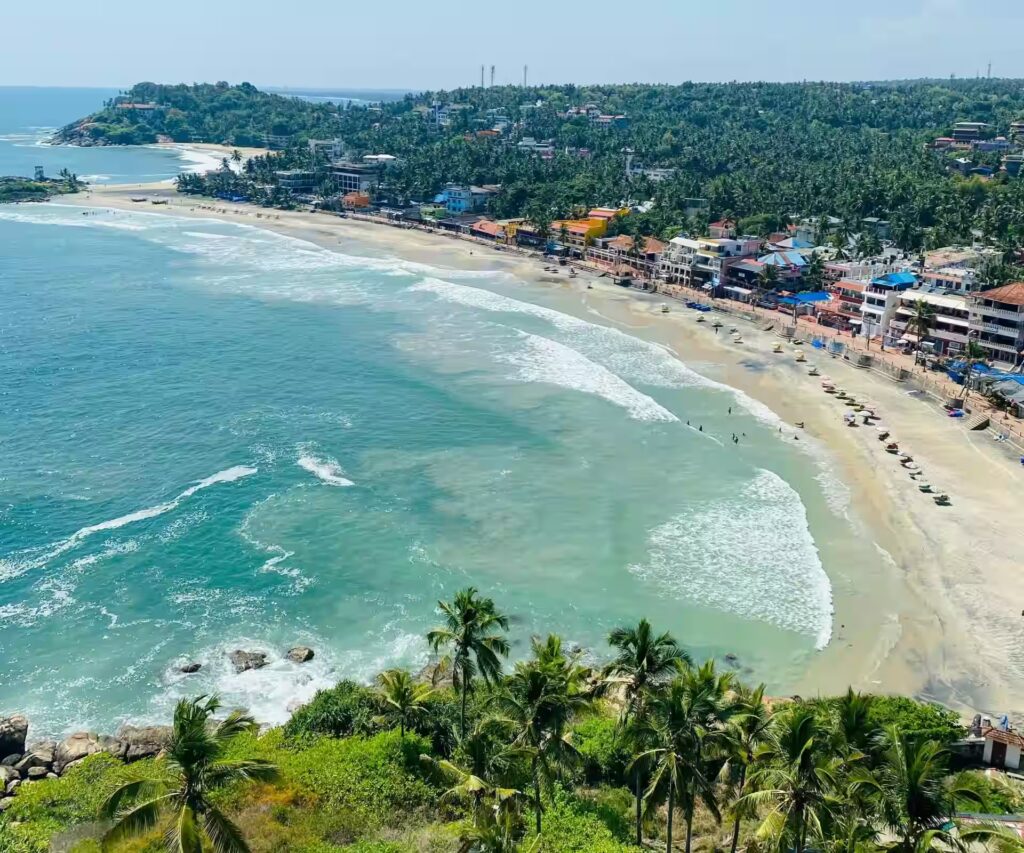 Kovalam Beach with palm trees in Kerala