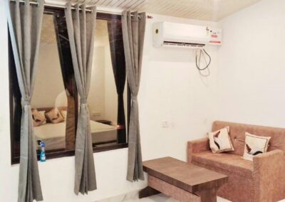 Sadhna Sadan Homestay Bedrrom Seating