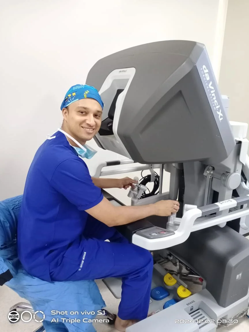 Dr. Shyam Mohan with Robotic Surgical System