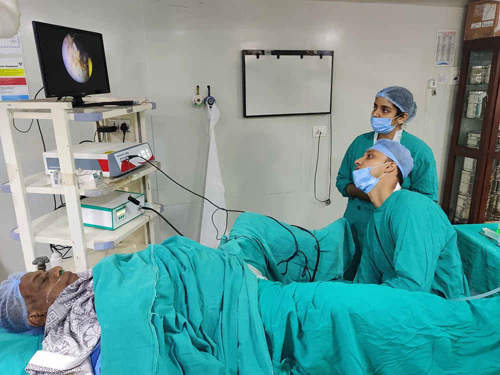 Dr. Shyam Mohan with Robotic Surgical System