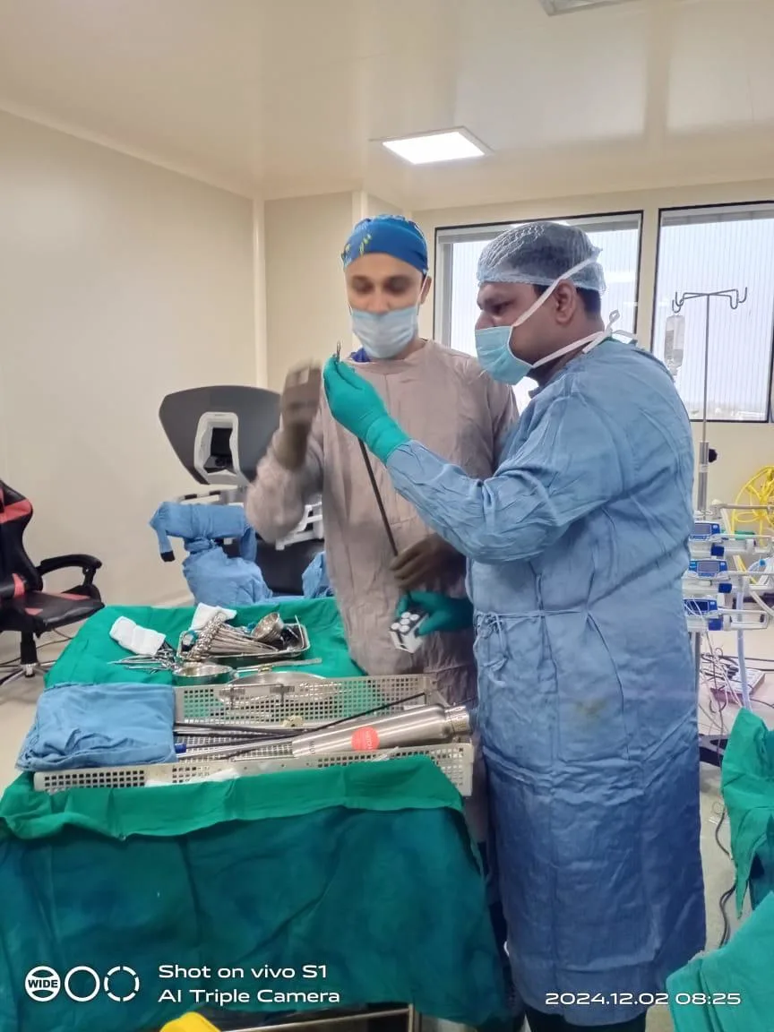 Dr. Shyam Mohan with Robotic Surgical System