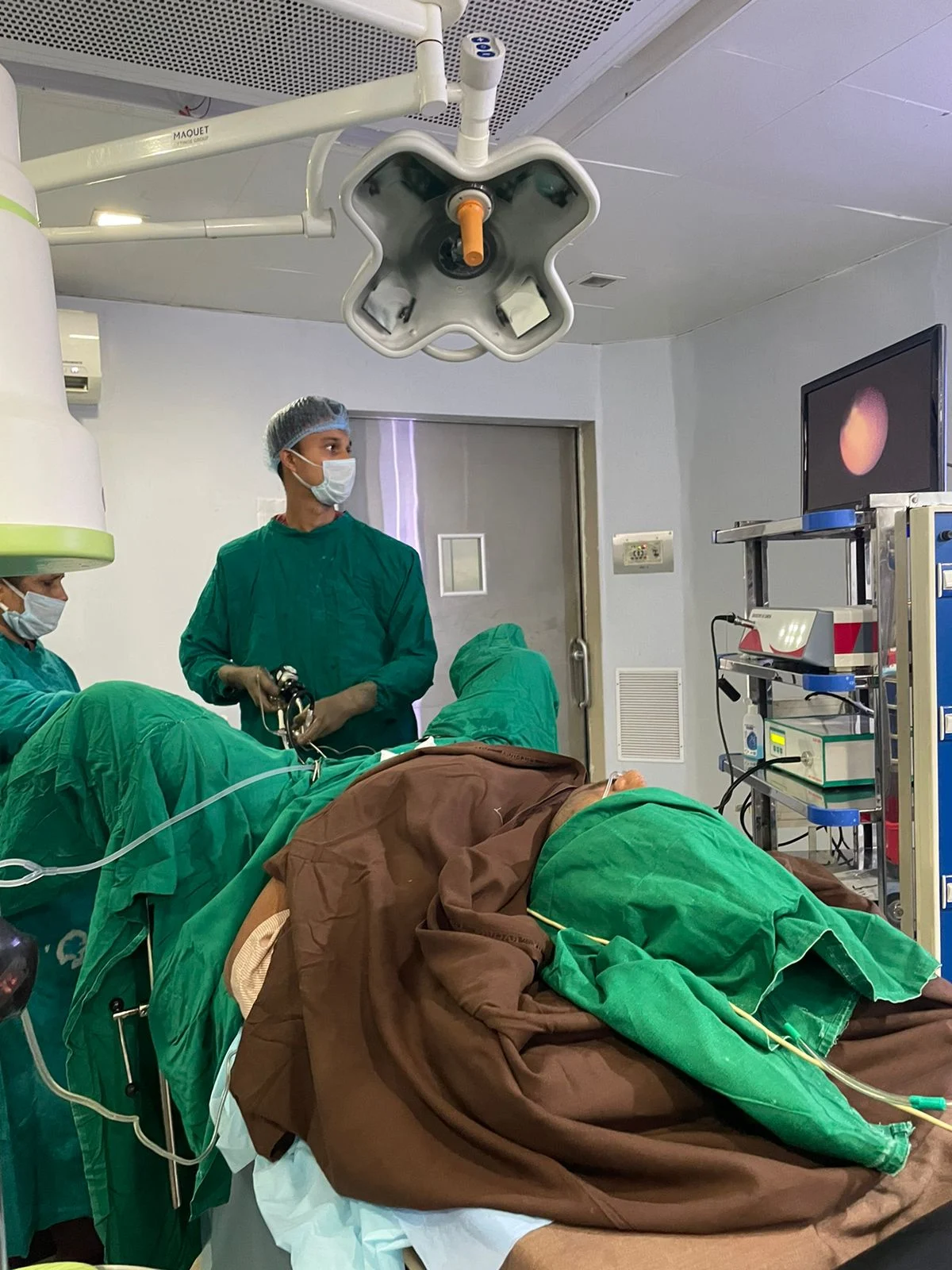 Dr. Shyam Mohan with Robotic Surgical System