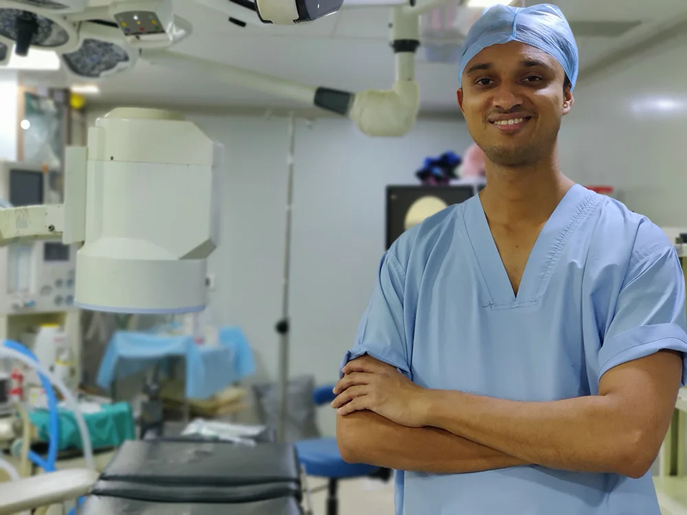 Dr. Shyam Mohan with Robotic Surgical System