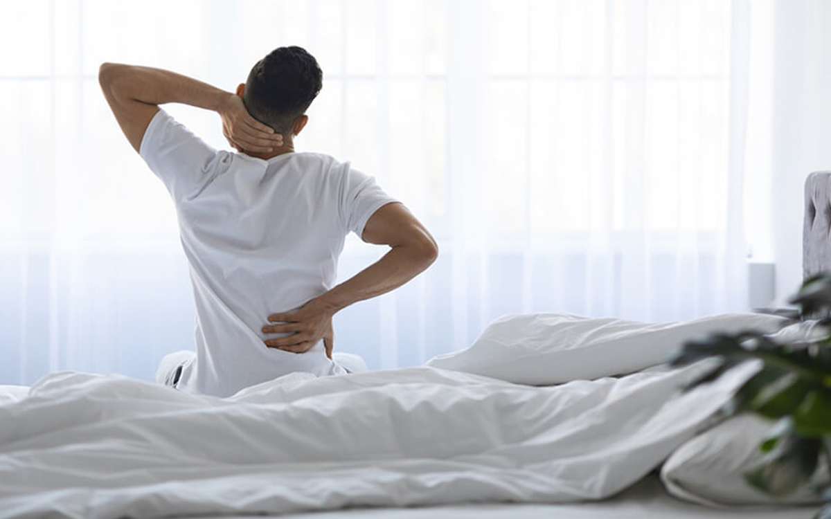 Patient receiving back pain consultation