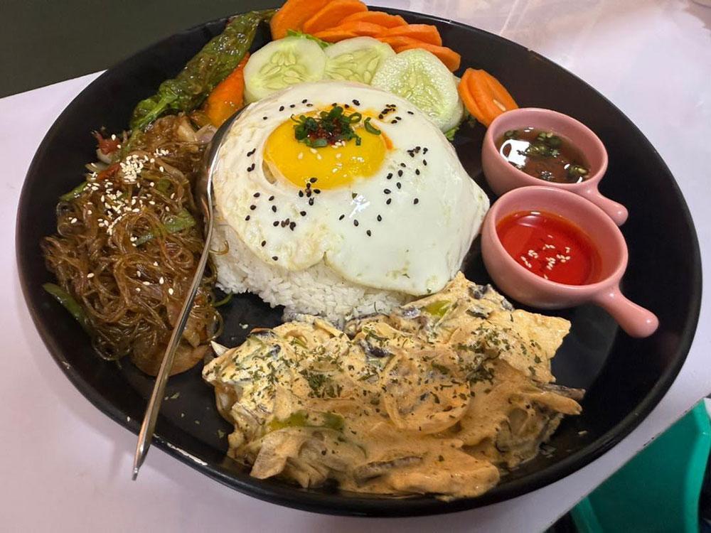 Building a future at home: Young couple chooses Café over abroad