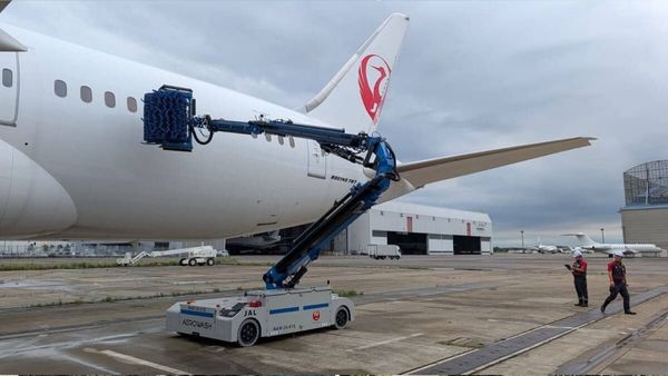 Japan Airlines launches robot for aircraft cleaning. Japan Airlines launches robot for aircraft cleaning.