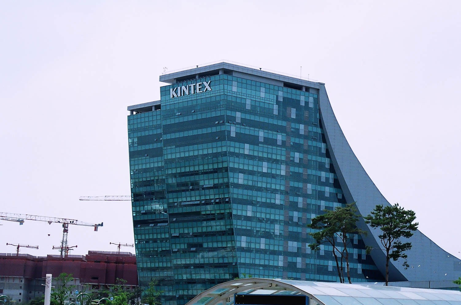Korean International Exhibition Corporation Logo