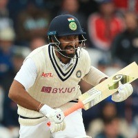 Cheteshwar Pujara has done well, but team's job not done yet: Rohit Sharma