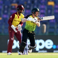 Warner, Marsh help Australia closer to semis spot: As it happened