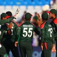Bangladesh seal Super 12 qualification with PNG win