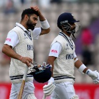 Kohli, Rahane dig in on truncated day - As it happened