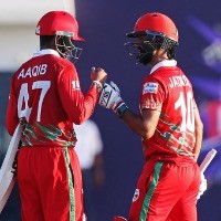 Highest partnership helps Oman cruise to a 10-wicket win after Zeeshan equals Vettori