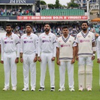 Team India wear black-armbands in memory of late Vasu Paranjpe