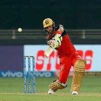All-round RCB thrash RR to increase playoffs hopes
