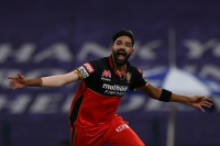 Record-breaking Siraj helps Bangalore maul Kolkata in Abu Dhabi