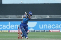 MI confirm spot in top two after comfortable win against DC