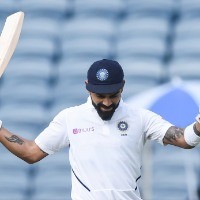 Kapil cautions Kohli against being over-aggressive in England